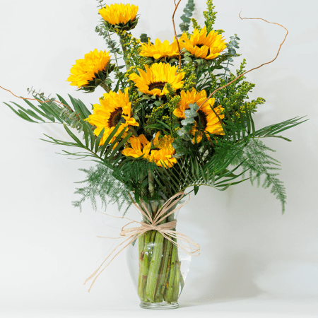 Bright, bold, and full of sunshine! This radiant arrangement features stunning Sunflowers, bringing warmth and cheer to any setting.